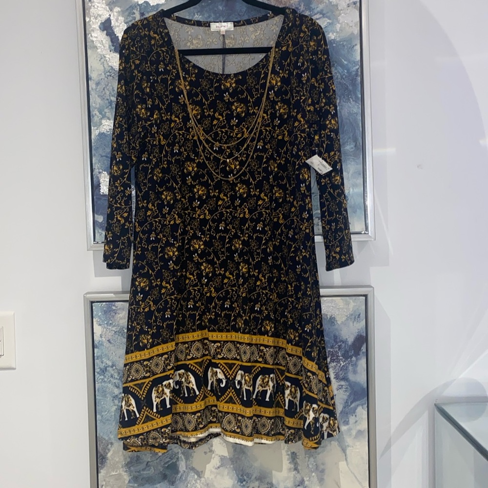 Fit and flare dress with removable gold chain